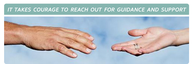 Two hands reaching toward each other against a blue sky, above the words: It takes courage to reach out for guidance and support.